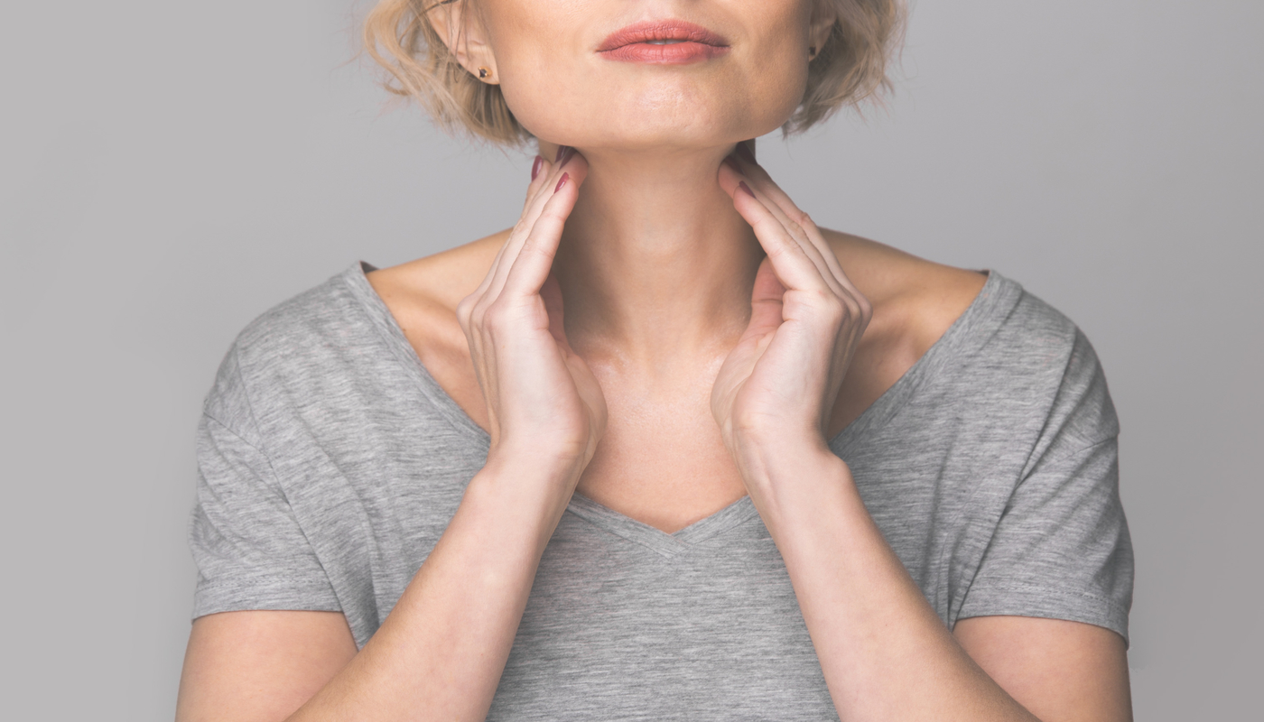 Elderly Woman Checking Thyroid Gland